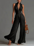 ZAKIRA | Eleganter Neckholder-Jumpsuit mit weitem Bein